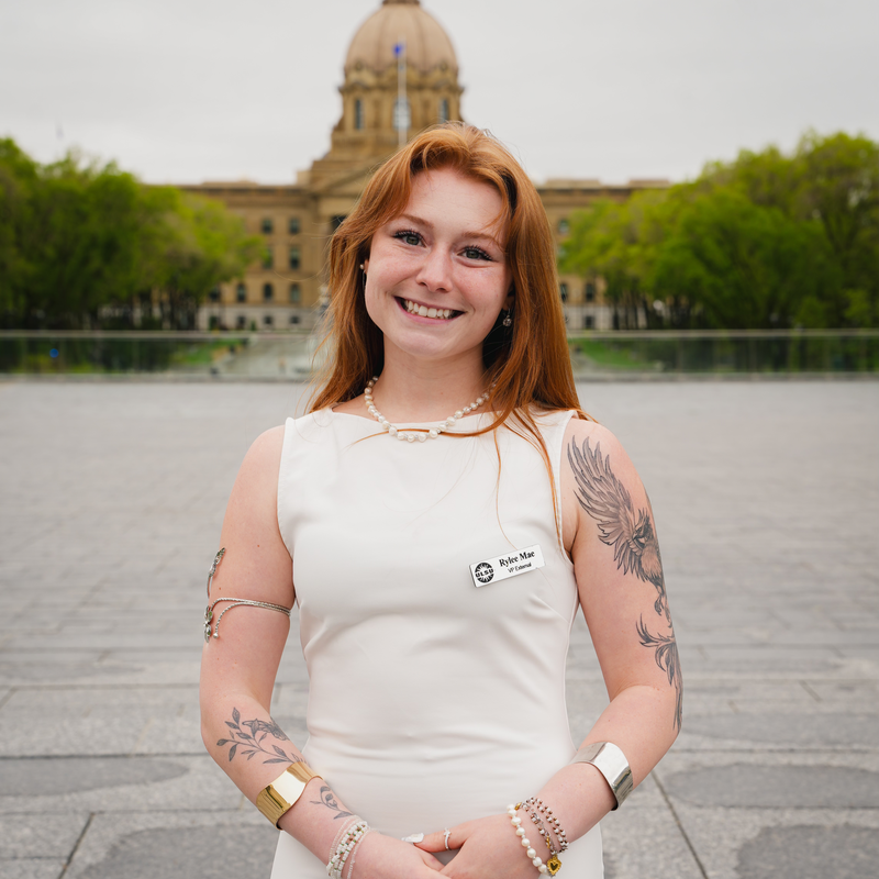Portrait of Rylee Mae in front of the Alberta Legislature